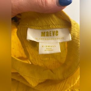 Bright yellow top by Anthropologie